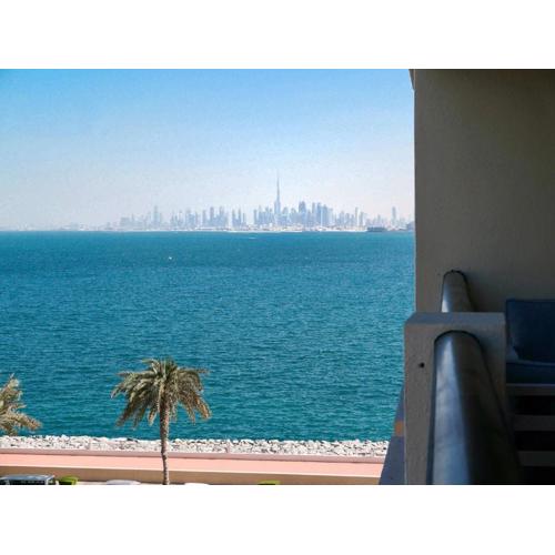 Ambient 1BR Apartment On The Beach at 5 Star Resort