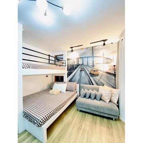 Antara-QueenBed-Balcony-HotShower-WorkCoffee Station-FullKitchen