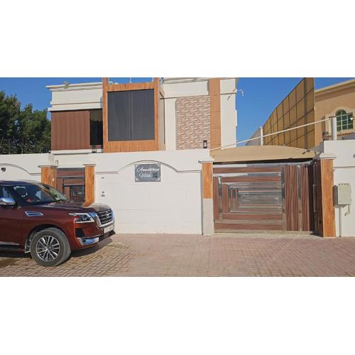 Anushthan Villa a private serviced villa for events and staycation with luxury views of garden and fountain pool in UAE