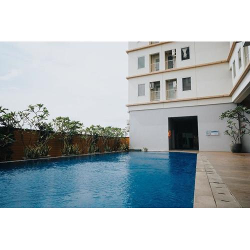 Apartemen Mahogany oleh Halahouse