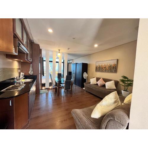Appleone Ayala Condo with Balcony