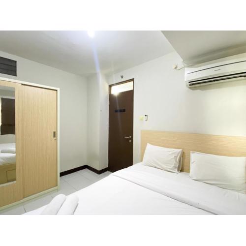 Basic 2BR at Lagoon Bekasi Town Square Apartment By Travelio