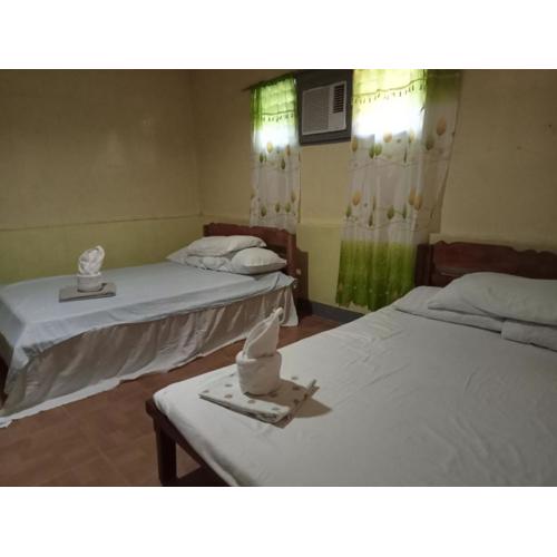 Basio's Place Tourist Inn by RedDoorz