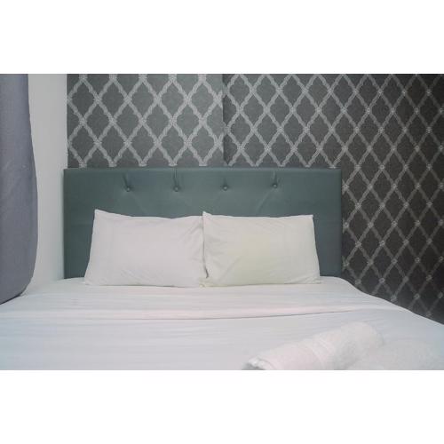 Bassura City 2BR Apartment with Minimalist Design near Shopping Mall By Travelio