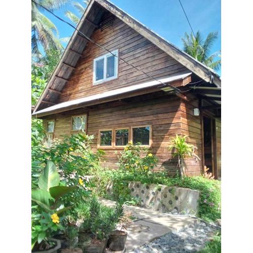 Bayawan Sunset Inn next to julsam and orange house