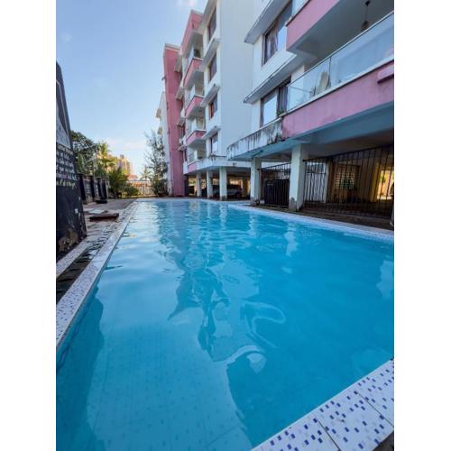 BEACH FRONT TWO BEDROOM APARTMENT WITH A SWIMMING POOl