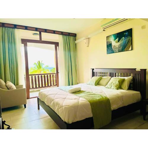 BeachFront 2 bedroom Apartment with WiFi&Netflix