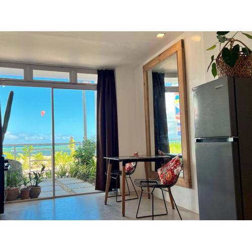 Beachfront Apartment with Kitchen and Outdoor Seating Area