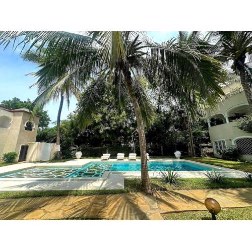 Beachfront Palm Haven