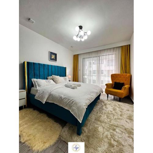 beautifully furnished apartment with swimming pool, fully equipped gym, ample parking space, children play area and amazing scenic city views