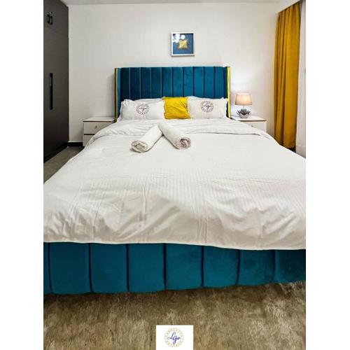 beautifully furnished apartment with swimming pool, fully equipped gym, ample parking space, children play area and amazing scenic city views