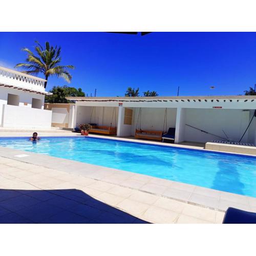 Becky Homes Diani Beach- 4BR with AC and Swimming Pool