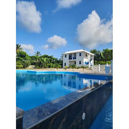 Bella Villa room with large pool and close to beach