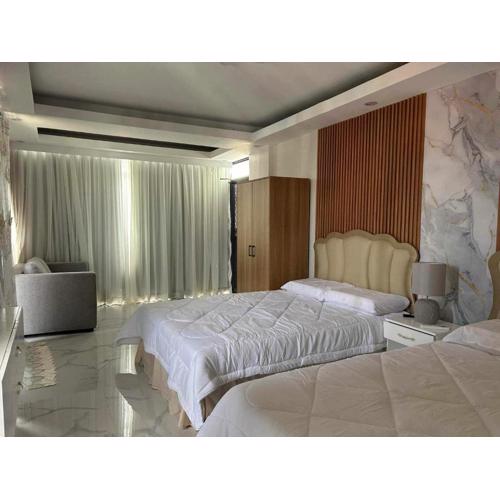 Benny's Hotel-Inspired & Condo-Inspired Rooms and Pool