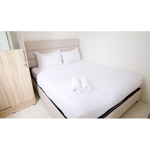 Best Choice 2BR at Puncak Permai Apartment Surabaya By Travelio