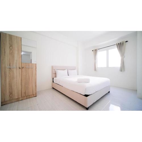 Best Choice and Homey 2BR at Puncak Dharmahusada Apartment By Travelio