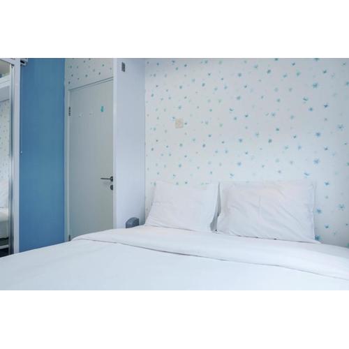 Best Comfy and Modern 2BR Green Pramuka Apartment By Travelio