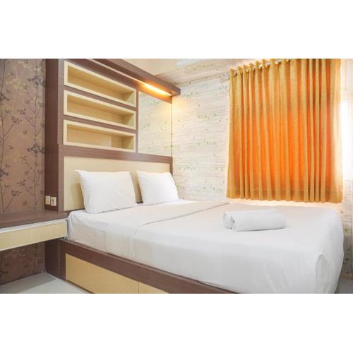 Best Deal and Comfy 1BR Green Pramuka City Apartment By Travelio