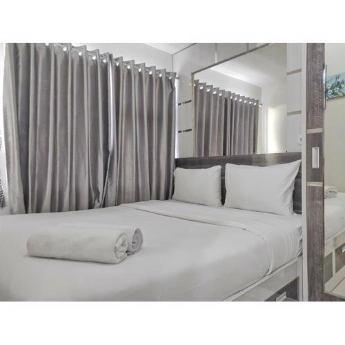 Best Deal and Cozy 2BR Vida View Apartment By Travelio