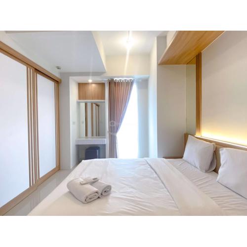 Best Deal and Restful 1BR Vasanta Innopark Apartment By Travelio