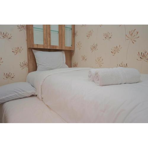 Best Furnished 2BR Mall Access at Green Pramuka Apartment By Travelio