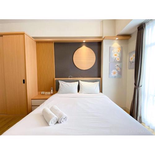 Best Homey 1BR at 52th Floor Vasanta Innopark Apartment By Travelio