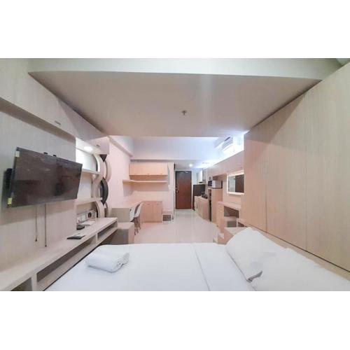 Best Homey and Modern Studio at Uttara The Icon Apartment By Travelio