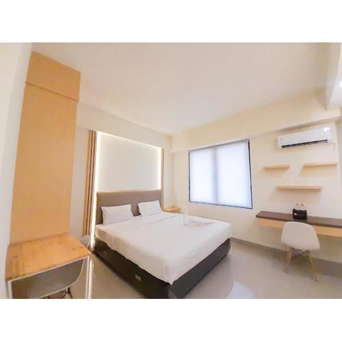 Best Homey and Restful Studio at Altuz Seturan Yogyakarta Apartment By Travelio