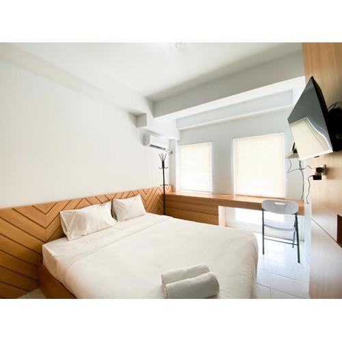 Best Homey Studio at Patraland Urbano Apartment By Travelio