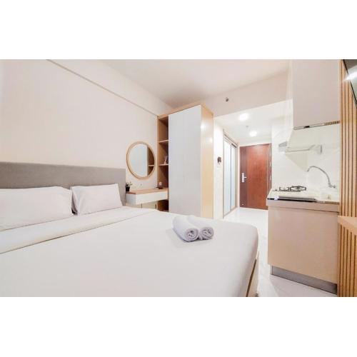 Best Homey Studio at Sky House BSD Apartment By Travelio