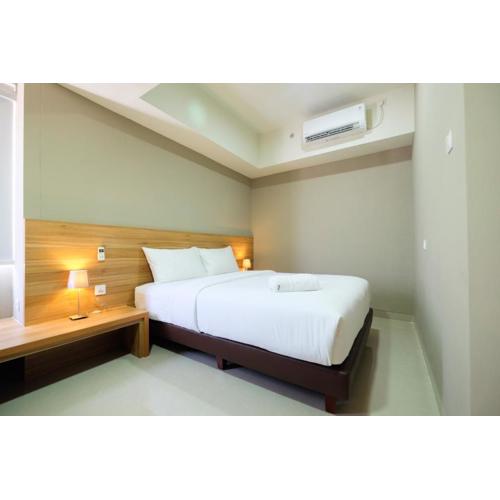 Best Location 1BR Apartment Mustika Golf Residence By Travelio