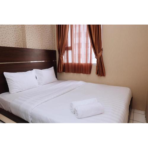 Best Location 2BR Menteng Square Apartment By Travelio