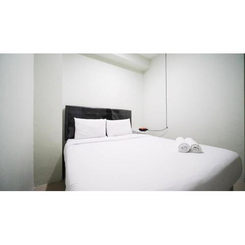 Best Location and Comfy 2BR at Bale Hinggil Apartment By Travelio