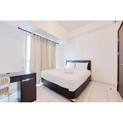 Best Modern 2BR at Casa de Parco Apartment By Travelio