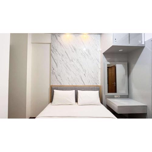 Best Price 2BR Apartment Vida View Makassar By Travelio