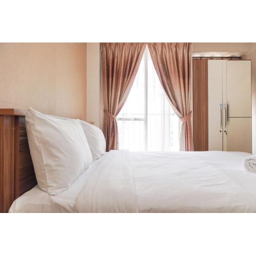 Best Price and Restful Studio at Tifolia Apartment By Travelio