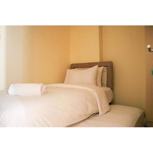 Best Strategic 2BR Apartment at Green Palm Residence By Travelio