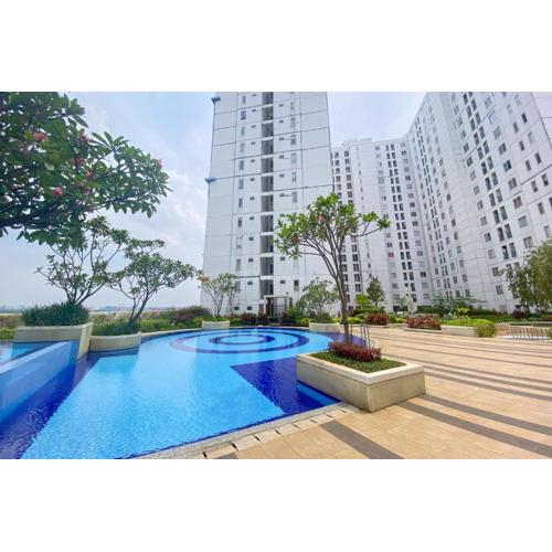 Best Strategic and Homey 2BR at Bassura City Apartment By Travelio