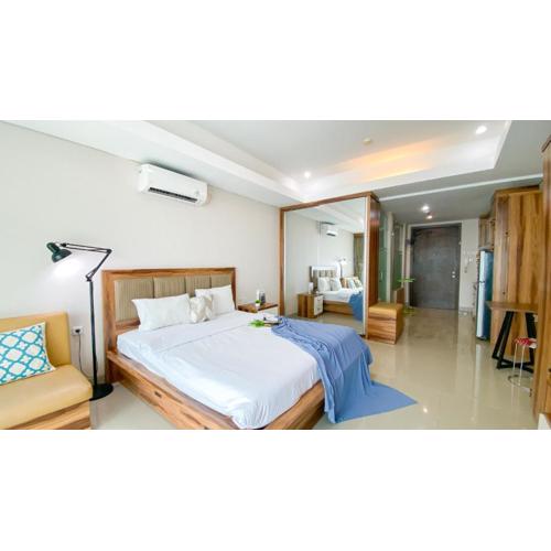 Big and Comfy Studio at Kemang Village Apartment By Travelio