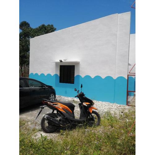 Bluewaves Apartment, scooter, car