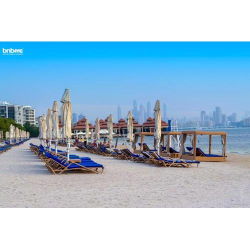 bnbme - Luxury 2BR Anantara Palm Apt Beachfront Lagoon Pools Balcony & Spa Access