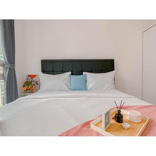 Brand New and Homey 2BR Apartment at Woodland Park Residence By Travelio