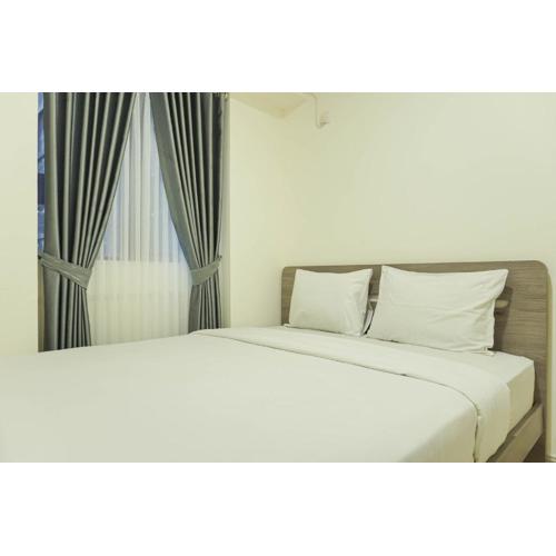 Brand New and Modern 2BR Meikarta Apartment By Travelio