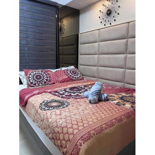 Bren Staycation in Shell Residences MOA