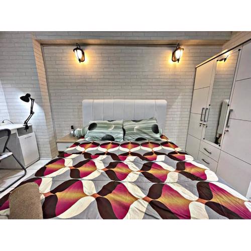 Bright Cozy Studio City View Android TV at Apt Greenbay Pluit Tower A