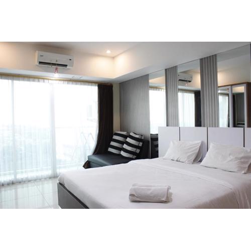 Bright Studio @ Tamansari La Grande Apartment By Travelio