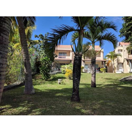 Bungalow Les Banians, front de mer avec piscine