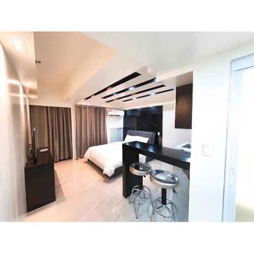 Burgundy McKinley Place Service Apartment