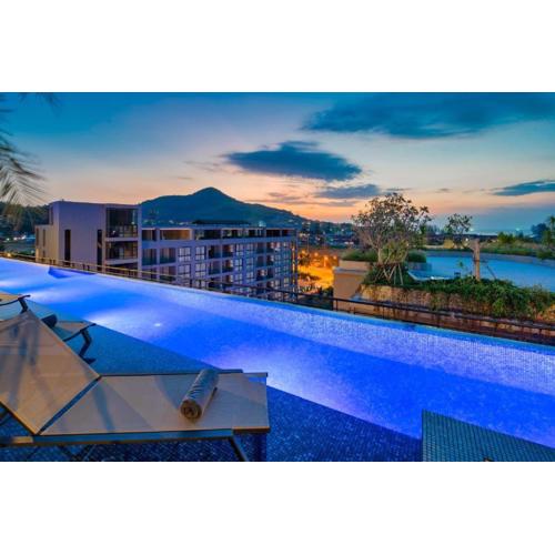 C118 Rooftop Pool Condo Walk to Beach, Gym, Wi-Fi