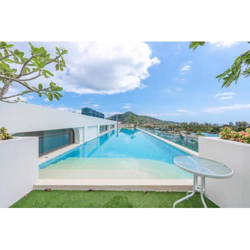 C190 Sleek 1BR with Infinity Pool, Gym, Rooftop